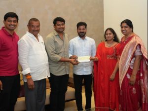 MLA Bathula Lakshma Reddy presented a cheque of Rs. 2 crore to CM Revanth Reddy