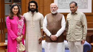 ram charan and modi in shakehand