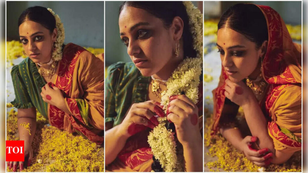 nithya-menen-photos-jasmine-flowers